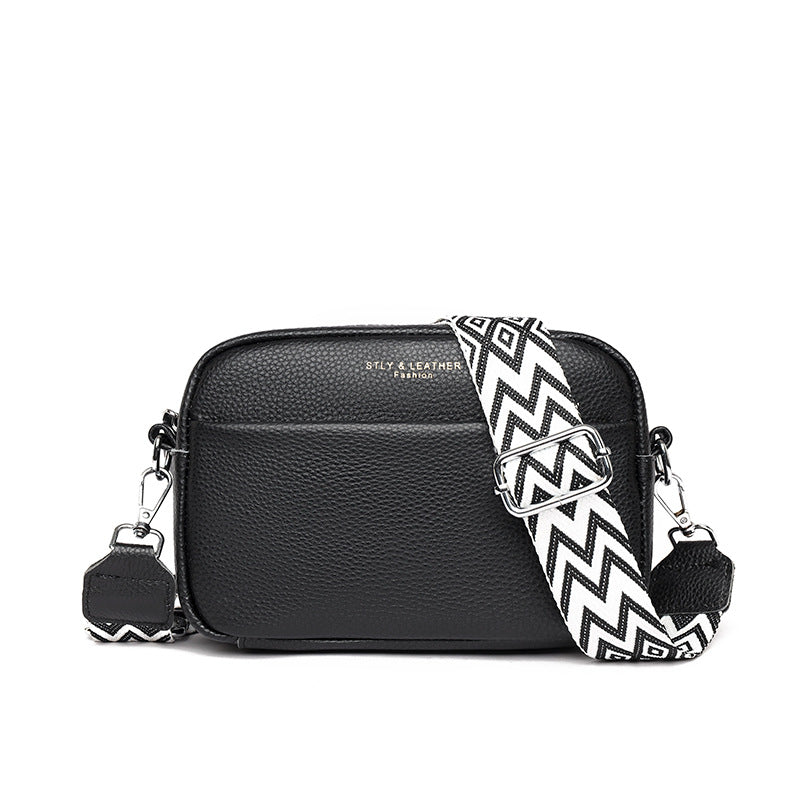 Kleine leren crossbody tas met brede band