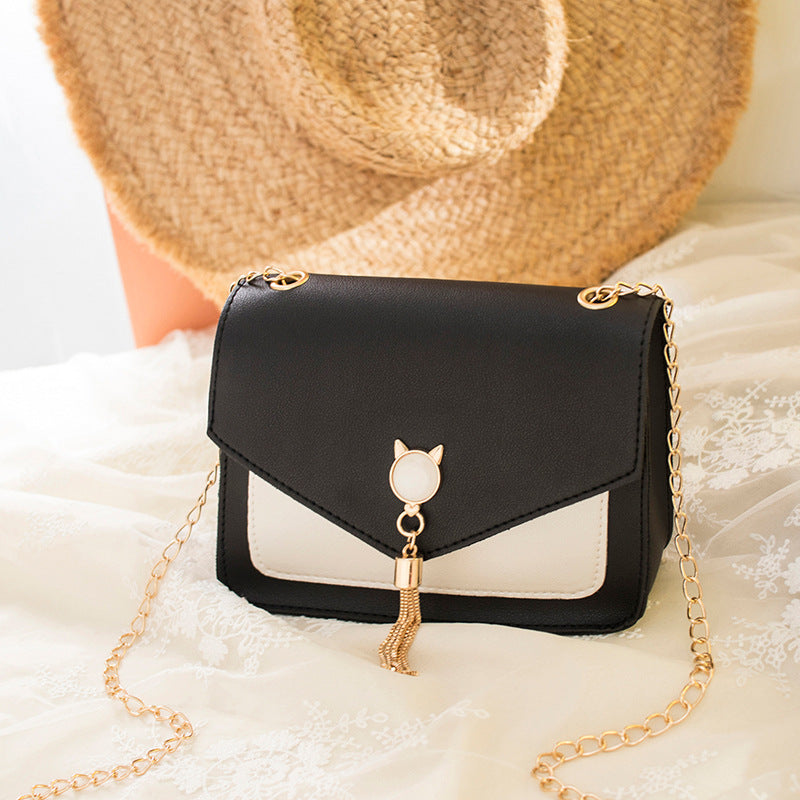 Vierkant crossbody tasje met kattensluiting