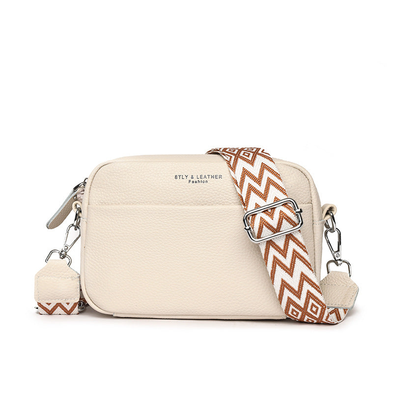 Kleine leren crossbody tas met brede band