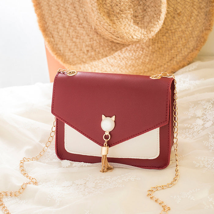 Saar | Kleine vierkante crossbody tas met kattensluiting