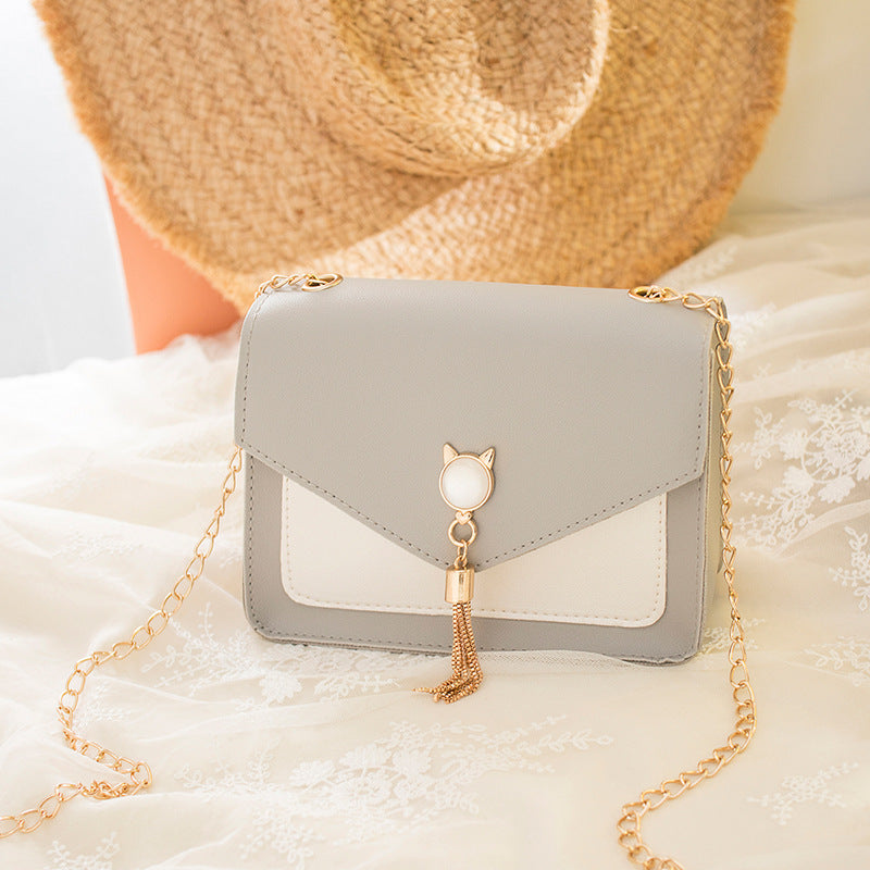 Vierkant crossbody tasje met kattensluiting