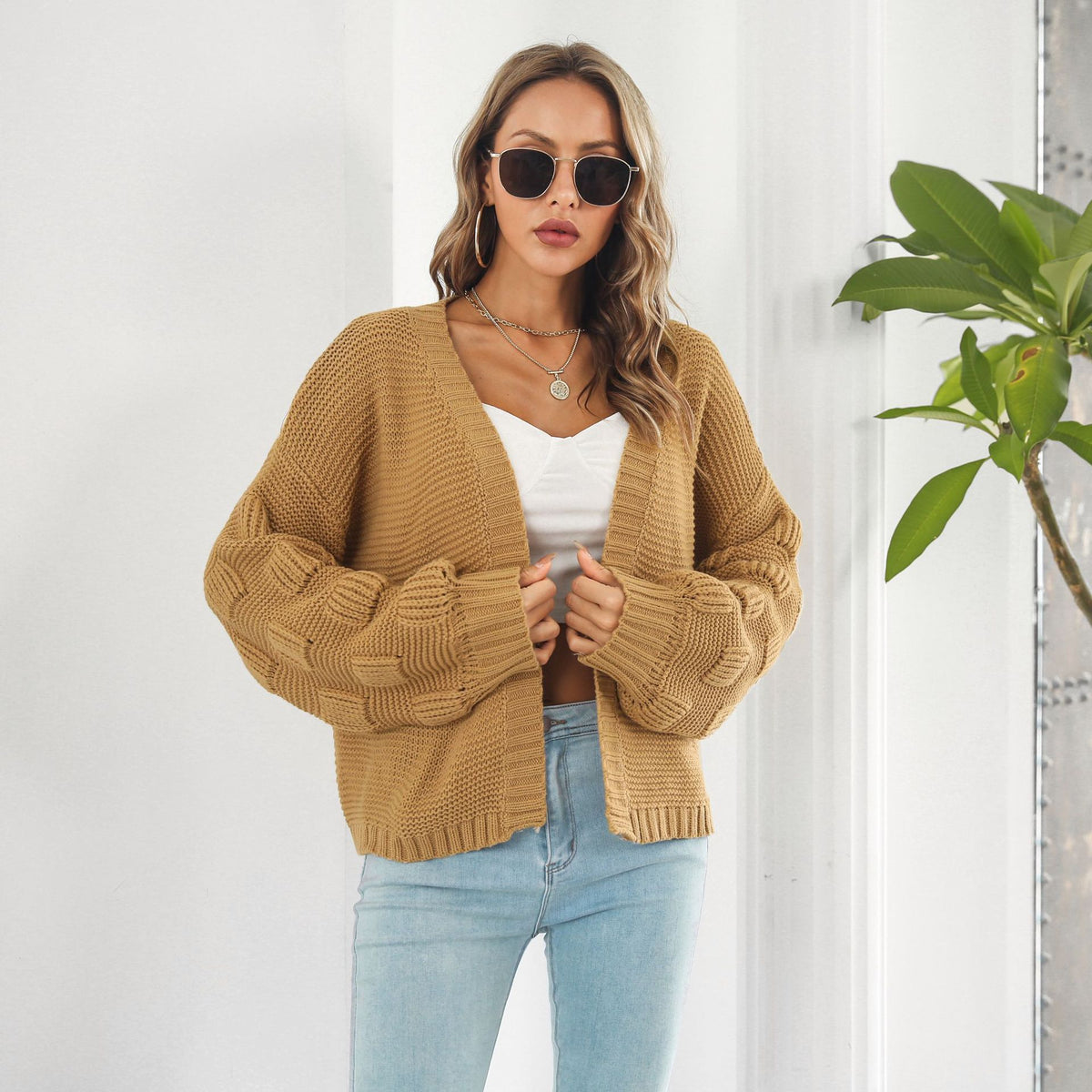 Kort grofgebreid vest met pofmouwen